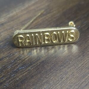 Gold 'RAINBOWS' Pin